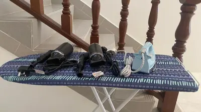 a group of microphones sitting on a chair at C&C Villa Pool Ipoh in Ipoh