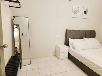 a bedroom with a bed with a mirror and a staircase at IPOH MENGLEMBU LOHAS 4BR3Bath14 PAX in Ipoh