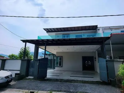 a house with a gate and a garage at 10Min to IPOH TOWN 4BR20PAX MAHJONG GAME KARAOK in Ipoh