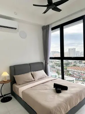 a bedroom with a bed with a ceiling fan at URBAN Georgetown 9Pax 4QueenBed 3Bedroom 2Bath 2carparks in Jelutong