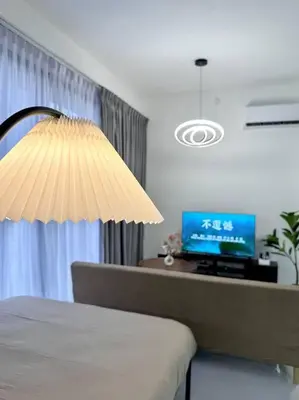 a bedroom with a bed and a desk with a television at URBAN Georgetown 9Pax 4QueenBed 3Bedroom 2Bath 2carparks in Jelutong