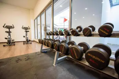 a room with a bunch of wine racks in a gym at Serene French Family Retreat with Sunrise View in Cameron Highlands