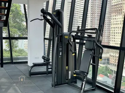 a gym with cardio equipment in a building at Urban Modern3BR CityView 7pax Infinity Pool in George Town