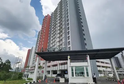 a large tall building with a parking lot in front of it at The Anderson Ipoh in Ipoh