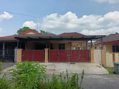 a house with a red gate in front of it at Homestay Amin 4 Fully Aircond Bedroom & 2 Bathroom in Kulim