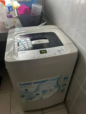 a tinder bin sitting on the floor in a room at Homestay Aishah in Seri Iskandar
