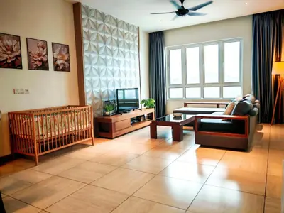 a living room with a couch and a crib at Ipoh Octagon Premium 7 Pax Condo One Free Parking by City Home Empire in Ipoh