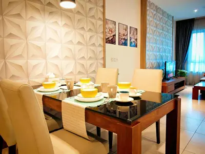 a dining room with a table and chairs at Ipoh Octagon Premium 7 Pax Condo One Free Parking by City Home Empire in Ipoh