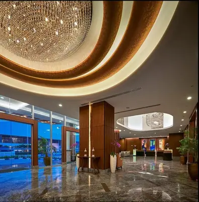 a lobby with a large chandelier on the ceiling at St Giles Wembley Penang in George Town