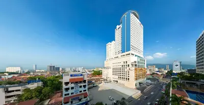 a tall building in a city with a street at St Giles Wembley Penang in George Town