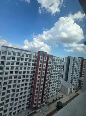 a large building with red and white windows on it at Stay at Anderson Condo 161 Ipoh Town FREEWIFITVBOX in Ipoh