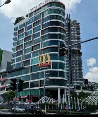 a large building with a mcdonalds sign on it at Unicorn Fairy Theme 2BR Airport Suite# Straits Intl# Pantai Hospt in Bayan Lepas