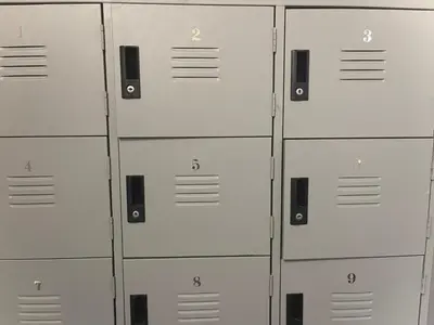 a group of lockers with numbers on them at Grand Star Hotel in Batu Ferringhi