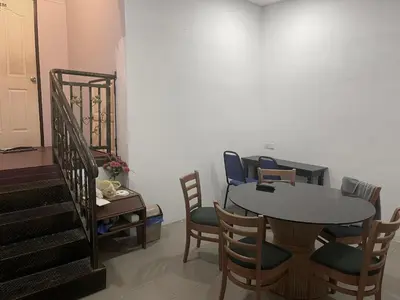 a dining room with a table and chairs at Grand Star Hotel in Batu Ferringhi