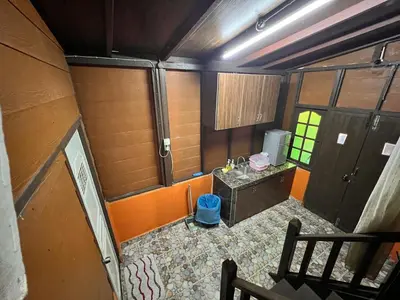 an overhead view of a small kitchen in a house at Homestay Jasmin in Taiping