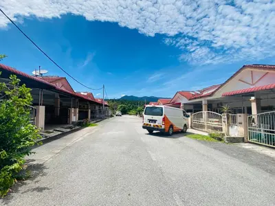 a white van parked on the side of a street at No 115 Homestay Tasik Raban Lenggong in Kampong Kuala Chegar