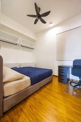 a bedroom with a bed and a ceiling fan at Beacon Suites #Georgetown #Rooftop Pool #20 #Cozy in George Town