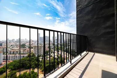 a balcony with a view of a city at Beacon Suites #Georgetown #Rooftop Pool #20 #Cozy in George Town