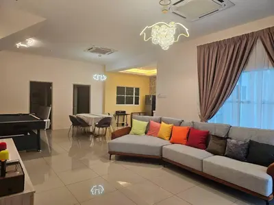 a living room with a couch and a piano at jia Residence 21 pax Karaoke & Snooker in Ipoh