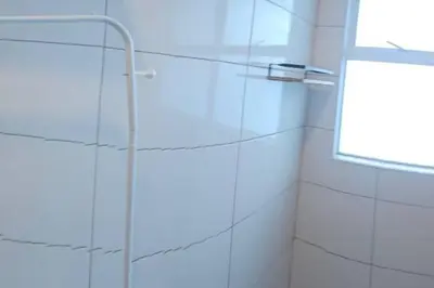 a shower with a glass door in a bathroom at jia Residence 21 pax Karaoke & Snooker in Ipoh
