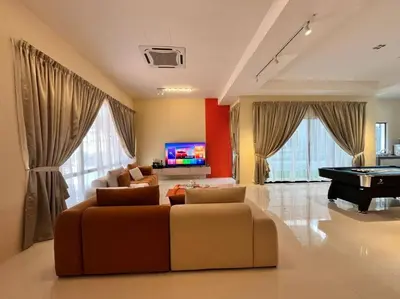 a living room with a couch and a pool table at Happiness Stay 20pax Karaoke & Snooker in Ipoh