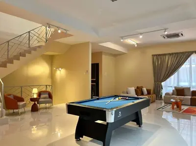 a living room with a pool table in it at Happiness Stay 20pax Karaoke & Snooker in Ipoh