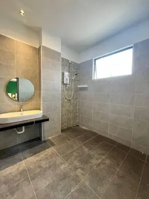 a bathroom with a sink and a mirror at Happiness Stay 20pax Karaoke & Snooker in Ipoh