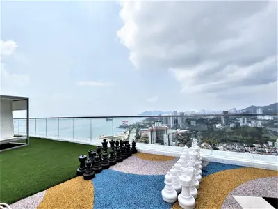 a chess game on the roof of a building at Sunlit Minimalist Suite, 7 Pax at Urban Suites Georgetown by SuperStay in Jelutong