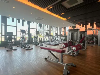 a gym with several exercise equipment in a room at Meritus - Perai, Penang in Perai
