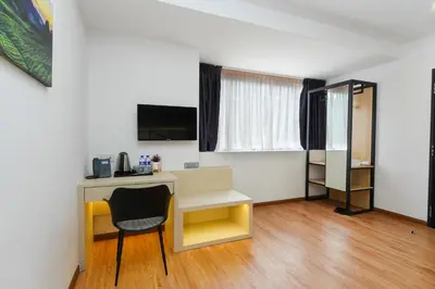 an office with a desk and a chair in a room at Merits Hotel Cameron Highlands in Cameron Highlands