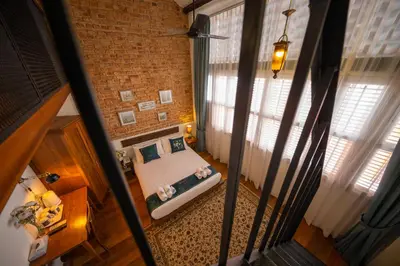 an overhead view of a bedroom with a bed at Sweet Cili Boutique Hotel in George Town