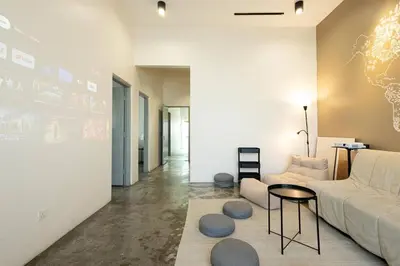 a living room with a couch and a table at InWood - Pet allow Ipoh homestay & BBQ in Ipoh