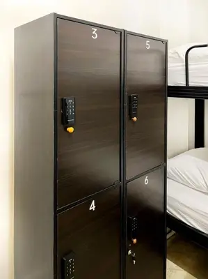 a couple of lockers in a room with bunk beds at Pine Armenian in George Town