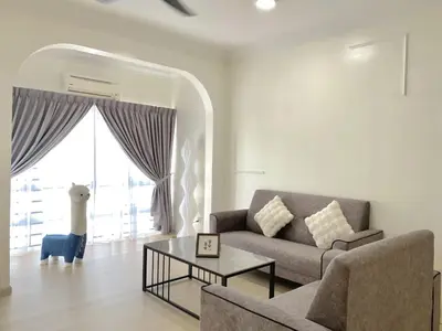 a living room with a couch and a table at Sekinchan 2008 Home \u60a6\u5ba2 \u76d0\u7cfb\u5976\u5496\u98ce\u6c11\u5bbf in Sekincan
