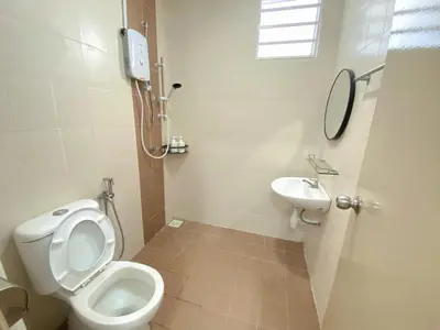 a bathroom with a toilet and a sink at Sekinchan 2008 Home \u60a6\u5ba2 \u76d0\u7cfb\u5976\u5496\u98ce\u6c11\u5bbf in Sekincan