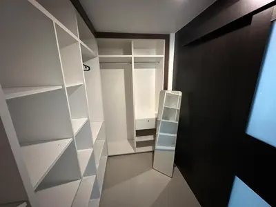 a small room with white shelves and a ladder at Landed House Gelugor 5BR 3B-20pax by 3C in Gelugor