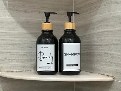 two bottles of soap sitting on a shelf at Landed House Gelugor 5BR 3B-20pax by 3C in Gelugor