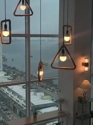a room with several lights and a large window at NEW - Panorama Komtar SeaView Meritime Suites in Jelutong
