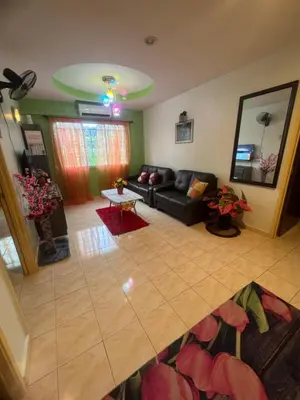 an overhead view of a living room with a couch at Homestay Permai Lake View in Kampong Batu Lapan