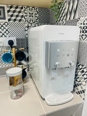 a coffee maker on a counter in a kitchen at The Pancarona240 in Seri Iskandar