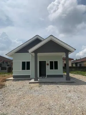a small house is shown with a driveway at HOMeSTAY DAMIA - Islam Homestay Only in Teluk Intan
