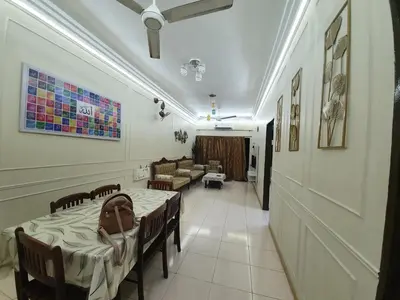 a room with a table and chairs and a waiting room at Teratak Ayuni with Private pool in Batu Gajah