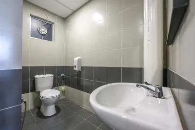 a bathroom with a sink and a toilet at Minion Family Adventure Homestay in Cameron Highlands Clover Home 6-30 in Brinchang