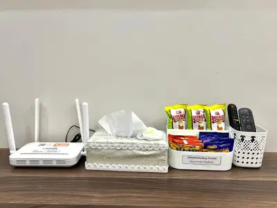 a table with some items on top of it at SFS Family Homestay Kulim in Kulim