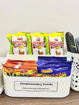 a box of dog snacks on a counter at SFS Family Homestay Kulim in Kulim
