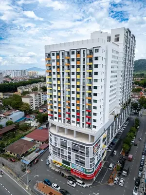 an overhead view of a tall white building in a city at The Sun Executive #BayanLepas #QueensbayMall #13 in Bayan Lepas