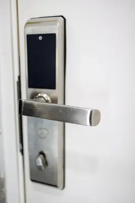 a door with a cell phone sticking out of it at The Sun Executive #BayanLepas #QueensbayMall #13 in Bayan Lepas
