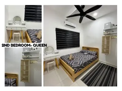 two pictures of a bedroom with a bed and a desk at KN Homestay in Butterworth