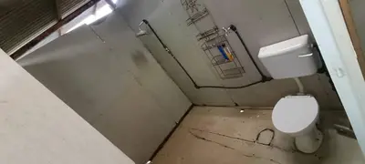 a dirty bathroom with a toilet and a bath tub at Bukit Limau rest house Merbau in Taiping