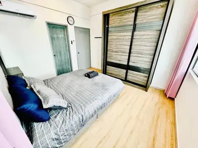 a bedroom with a bed and a large window at 2BR LaPrimo Homestay Bandar Meru Raya Ipoh in Ipoh